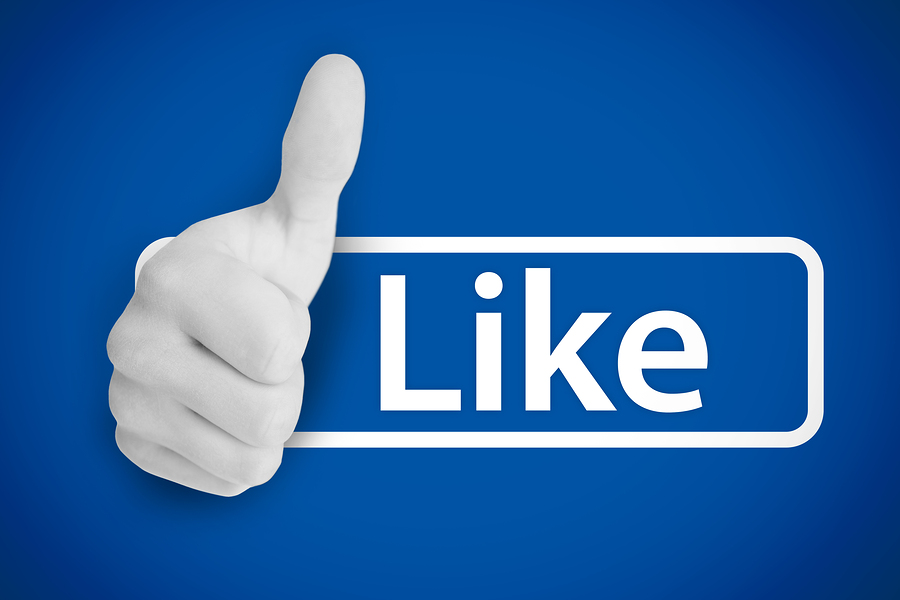 White thumb up next to the like from social networks on blue background