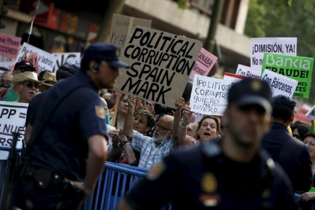 File photo of people protesting outside the People's Party (PP) headquarters in Madrid, Spain