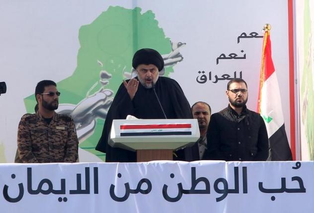 Prominent Iraqi Shi'ite cleric Moqtada al-Sadr speaks during a protest against corruption at Tahrir Square in Baghdad