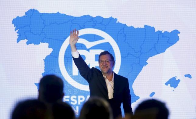File photo of Spanish Prime Minister Mariano Rajoy gesturing during a meeting presenting People's Party (PP) candidates for the upcoming Spanish general election in Barcelona, Spain