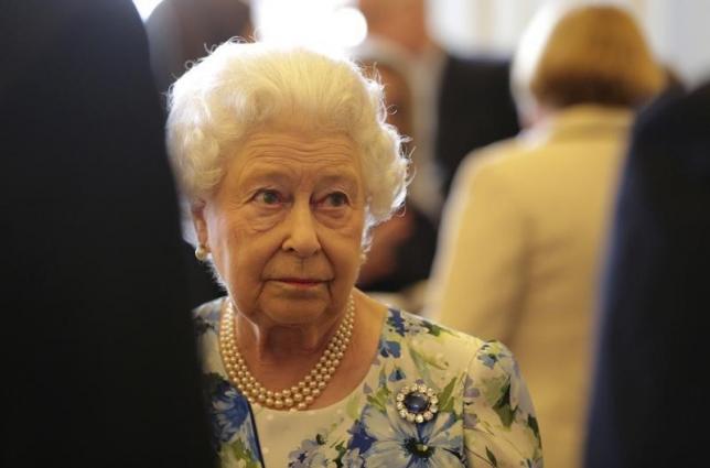 Britain's Queen Elizabeth speaks to Prime Minister David Cameron during a reception in Buckingham Palace in London