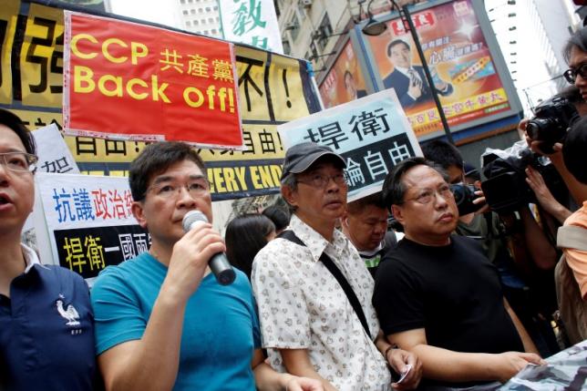 Bookseller Lam Wing-kee takes part in a protest march with pro-democracy lawmakers and supporters in Hong Kong