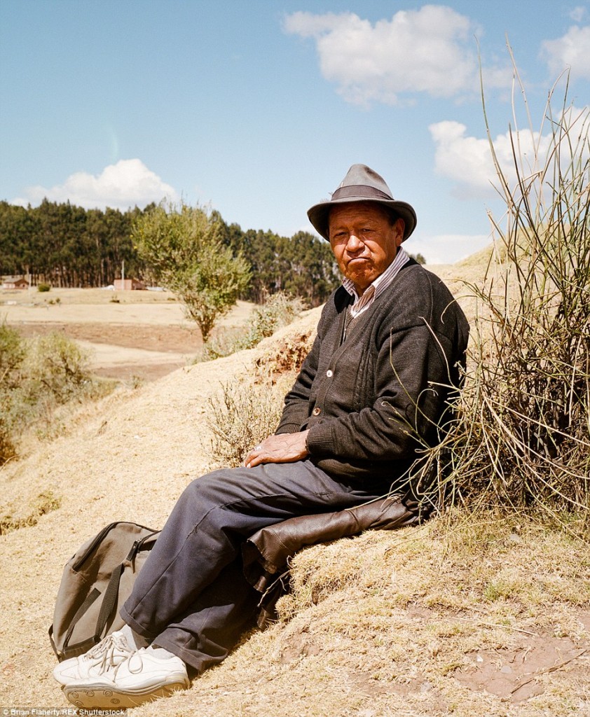 2E4BA54F00000578-3311645-A_local_man_rests_in_the_hills_above_Cusco_a_city_which_is_known-a-14_1447153963382