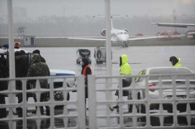 Members of operative services are seen at airport of Rostov-On-Don