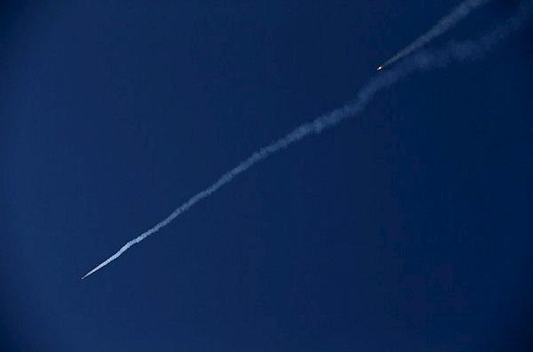 Ballistic missiles are launched and tested in an undisclosed location, Iran, in this handout photo released by Farsnews