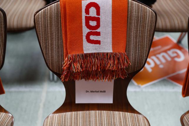 Empty chair of Merkel German Chancellor and leader of  CDU party is pictured during election campaign rally in Haigerloch
