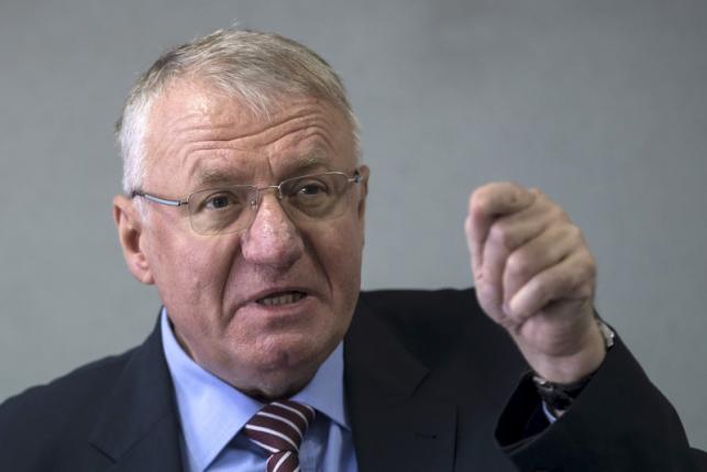Serbian nationalist leader Seselj speaks during a news conference inside his Serbian Radical Party headquarters in Belgrade