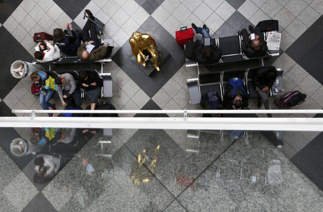 Passengers wait for their flights in Munich airport