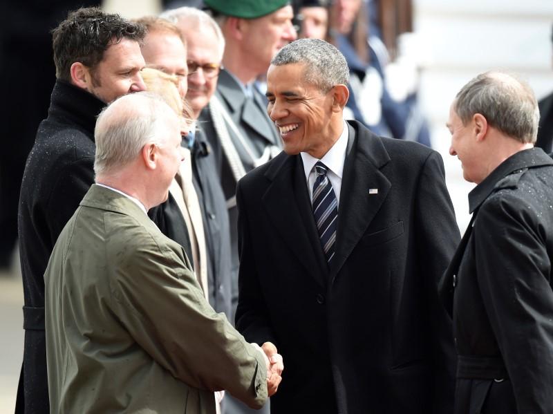 U.S. President Obama is greeted by Deputy Chief of Mission Logsdon after his arrival to Hanover airport