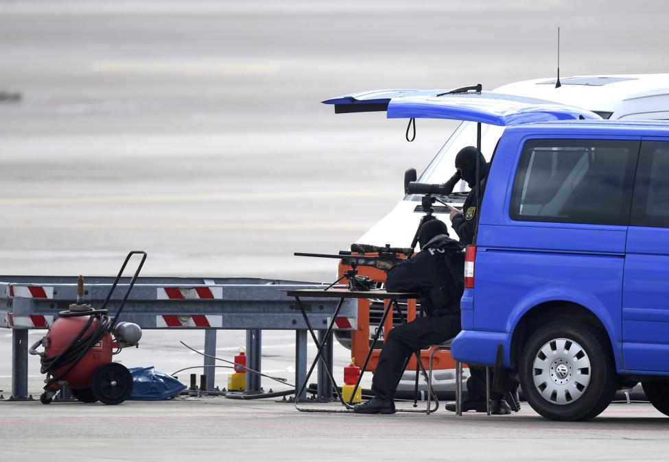 German police officers prepare their equipment ahead of U.S. President Obama visit to Hanover