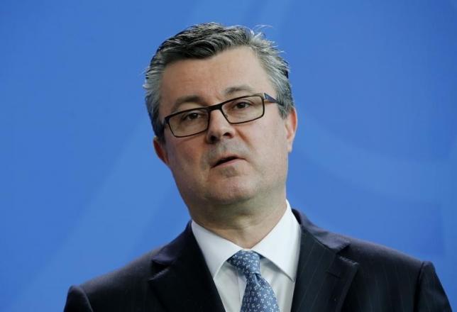 Croatian Prime Minister Oreskovics addresses a news conference at the Chancellery in Berlin