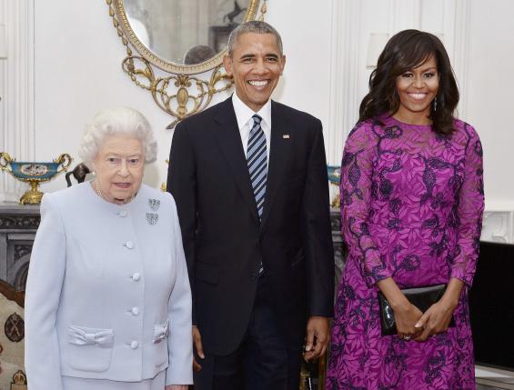 Queen Elizabeth II (left) stands with the President and First Lady of the United States Barack Obama and his wife Michelle, in the Oak Room at Windsor Castle