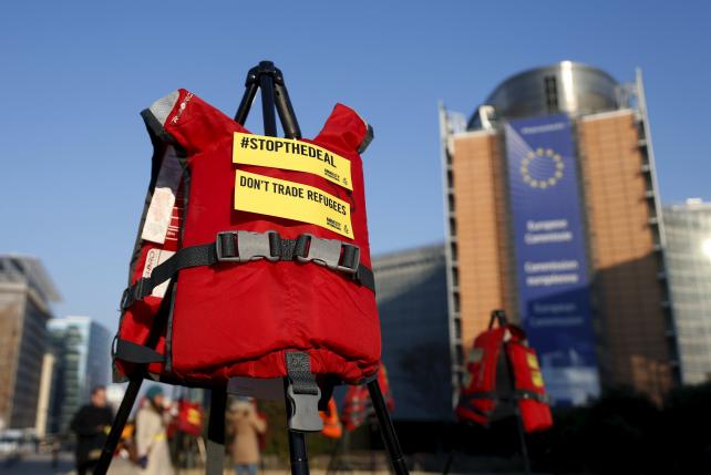 Lifejackets are pictured during a protest ahead of a EU summit over migration in Brussels