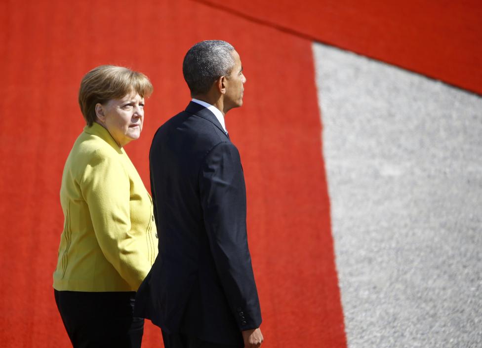 U.S. President Obama and German Chancellor Merkel attend a welcome ceremony at Schloss Herrenhausen in Hanover