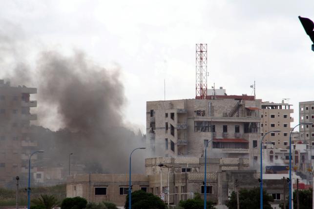 Smoke rises after explosions hit the Syrian city of Tartous