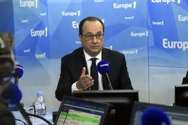 France's President Francois Hollande replies to a question during a morning radio show on France's Europe 1 station in Paris