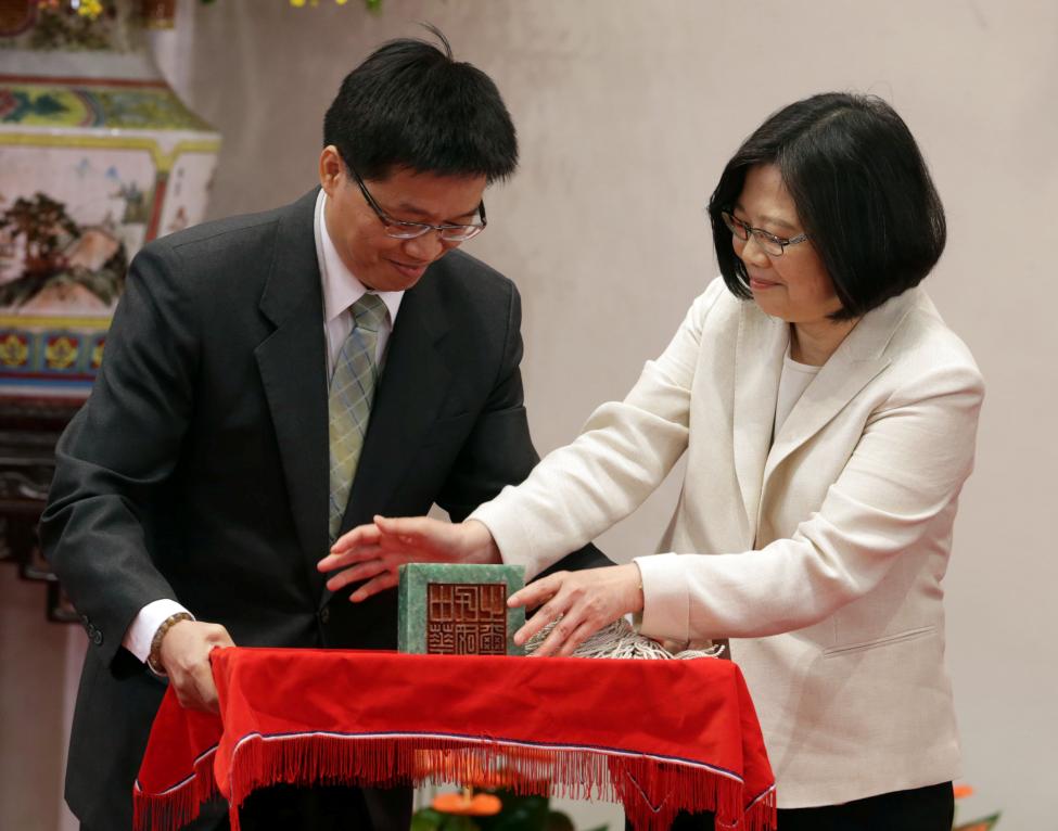 Taiwan's President Tsai Ing-wen receives an official seal after swearing in at the Presidential Office in Taipei