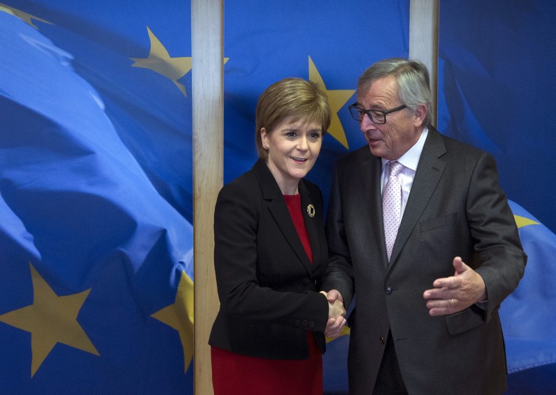 Scotland's First Minister Sturgeon is welcomed by European Commission President Juncker ahead of a meeting at the EC headquarters in Brussels