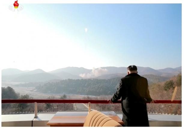 North Korean leader Kim Jong Un watches a long range rocket launched into the air in this still image taken from KRT footage and released by Yonhap