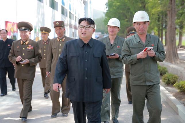 North Korean leader Kim Jong Un visits the construction site of Ryongaksan soap factory in this undated photo released by North Korea's Korean Central News Agency