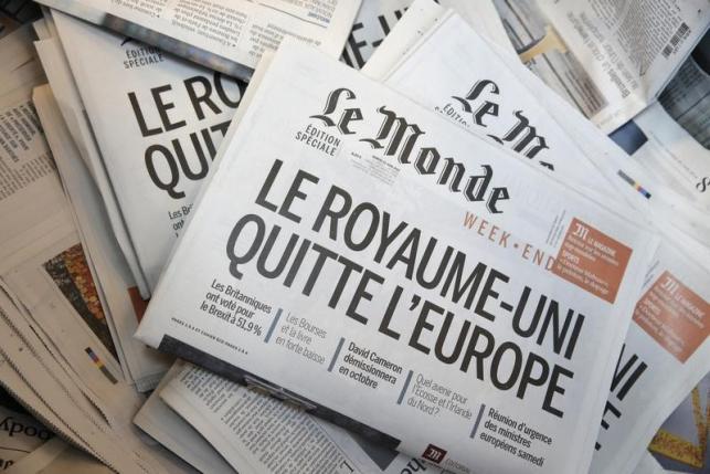 The front page of daily newspaper Le Monde is seen at their printing works following Britain's referendum results to leave the European Union