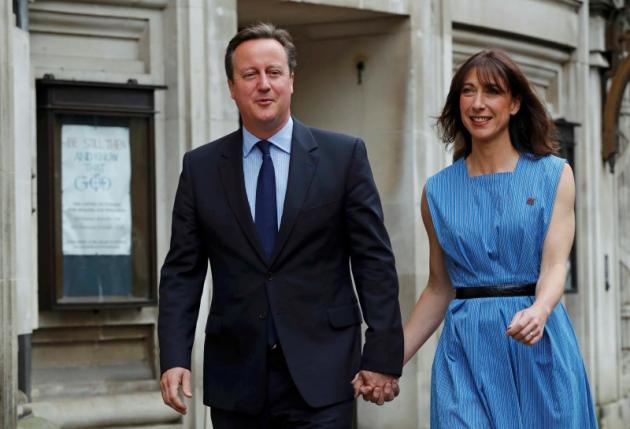 Britain's Prime Minister David Cameron and his wife Samantha arrive to vote in the EU referendum, at a polling station in central London