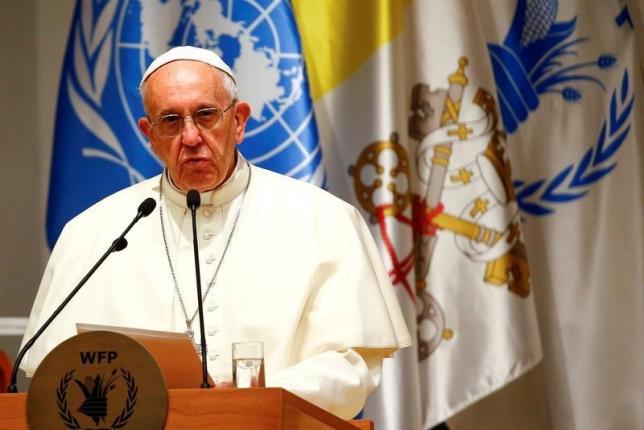 Pope Francis delivers his speech during a visit at the United Nations World Food Programme (WFP) headquarters in Rome