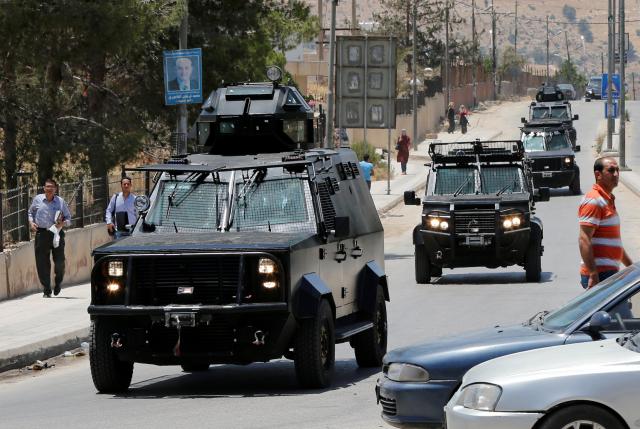 Jordanian security vehicles seen near the General Intelligence directorate offices near al Baqaa Refugee Camp