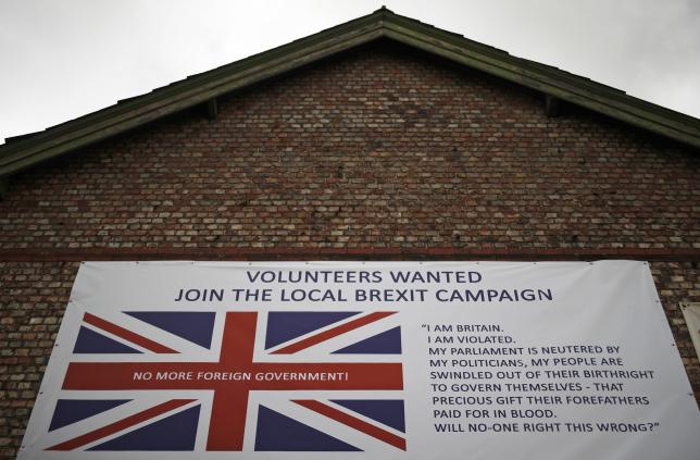 A banner encouraging people to support a local Brexit campaign hangs on the side of a building in Altrincham