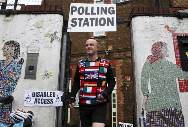 A man wearing a European themed cycling jersey leaves after voting at a polling station for the Referendum on the European Union in north London