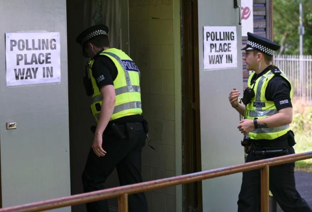 Police arrive to cast their votes in the EU referendum, at Broomhouse Community Hall in Glasgow