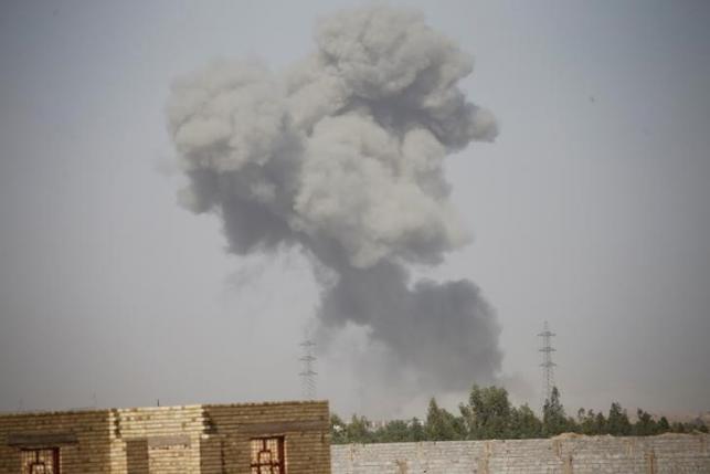 Smoke rises from clashes near Falluja